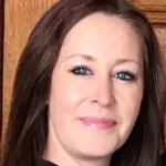 Based in Portsmouth, Hampshire, ILS Case Manager Karen Warren, has long brown hair and is wearing a black shirt.