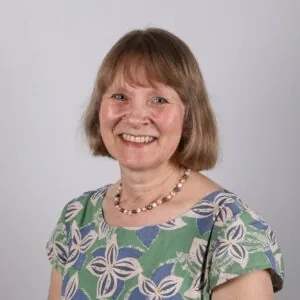 Based in Plymouth, Devon, ILS case manager Louise Hooper, is wearing a green and white floral top, and exudes a friendly demeanour.
