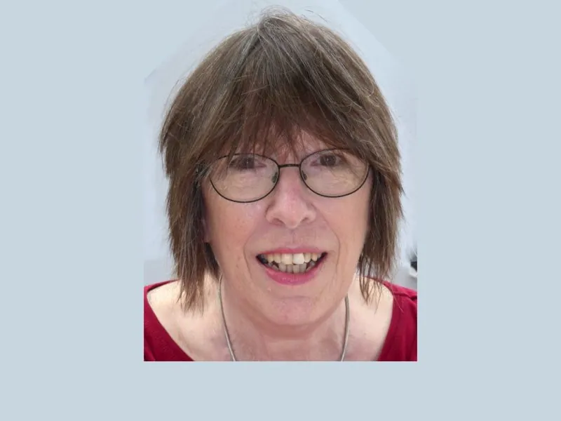 ILS Clinical Lead Sarah-Jane Davies, with glasses, illustrated in an article discussing housing adaptations for clients.