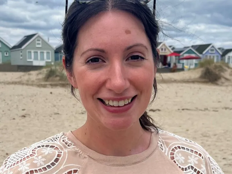 Based in Southampton, Hampshire, ILS Case Manager Melissa Blackney is a woman with long brown hair and is wearing a cream top.